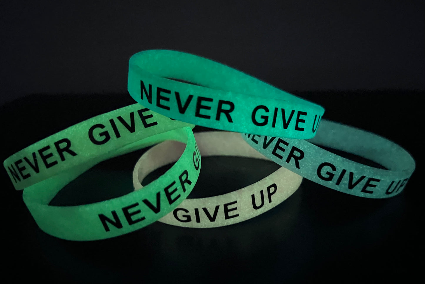 Never give up glow wristbands